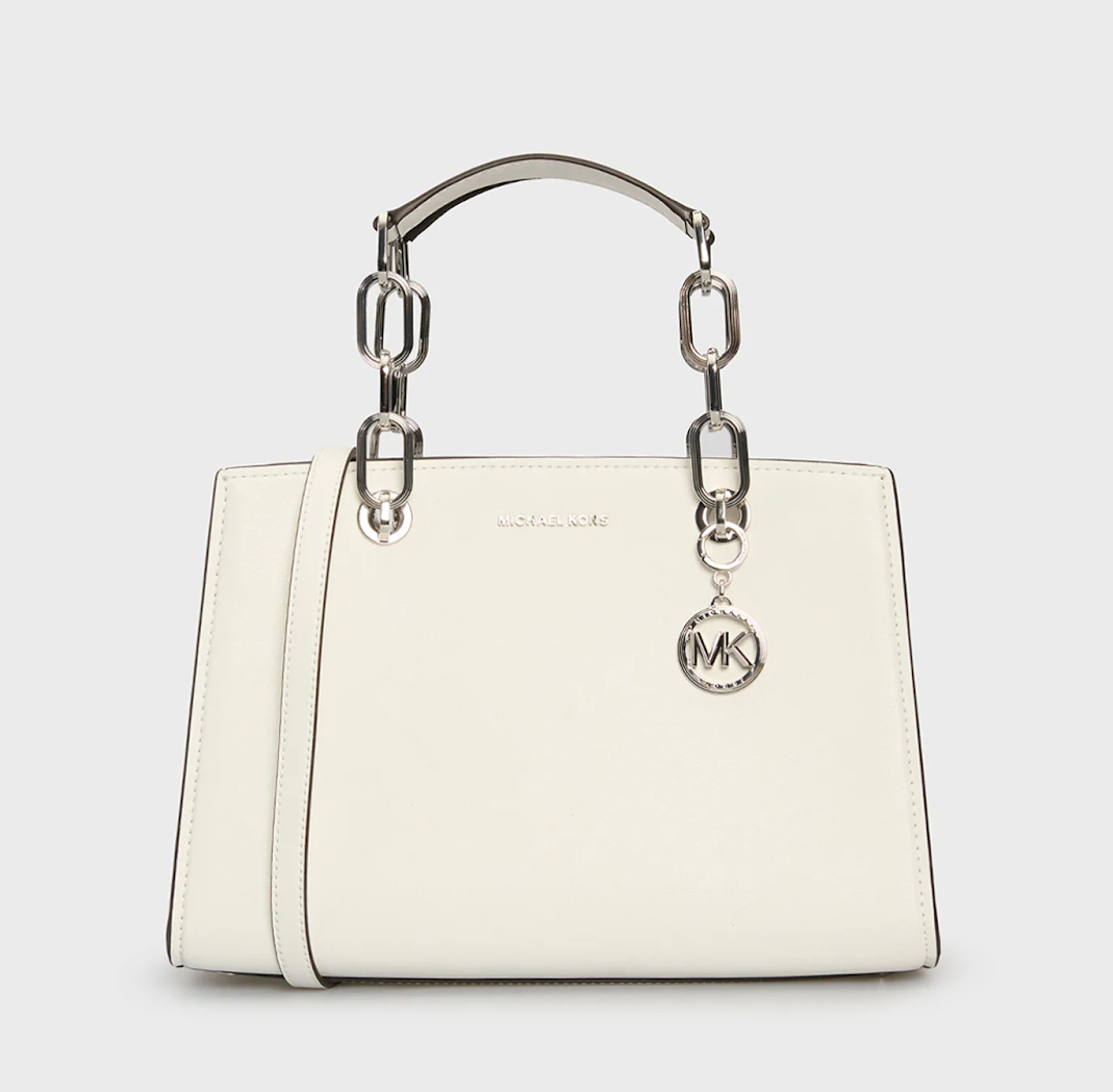 Жіночий стильний образ у дусі Michael Kors 2024 року